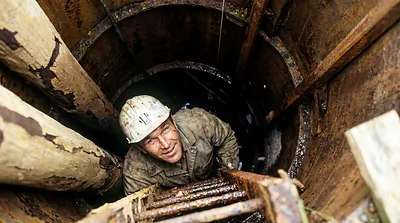 Dan Blankenship and Borehole 10-X (AI-assisted historical reconstruction, not a photograph)