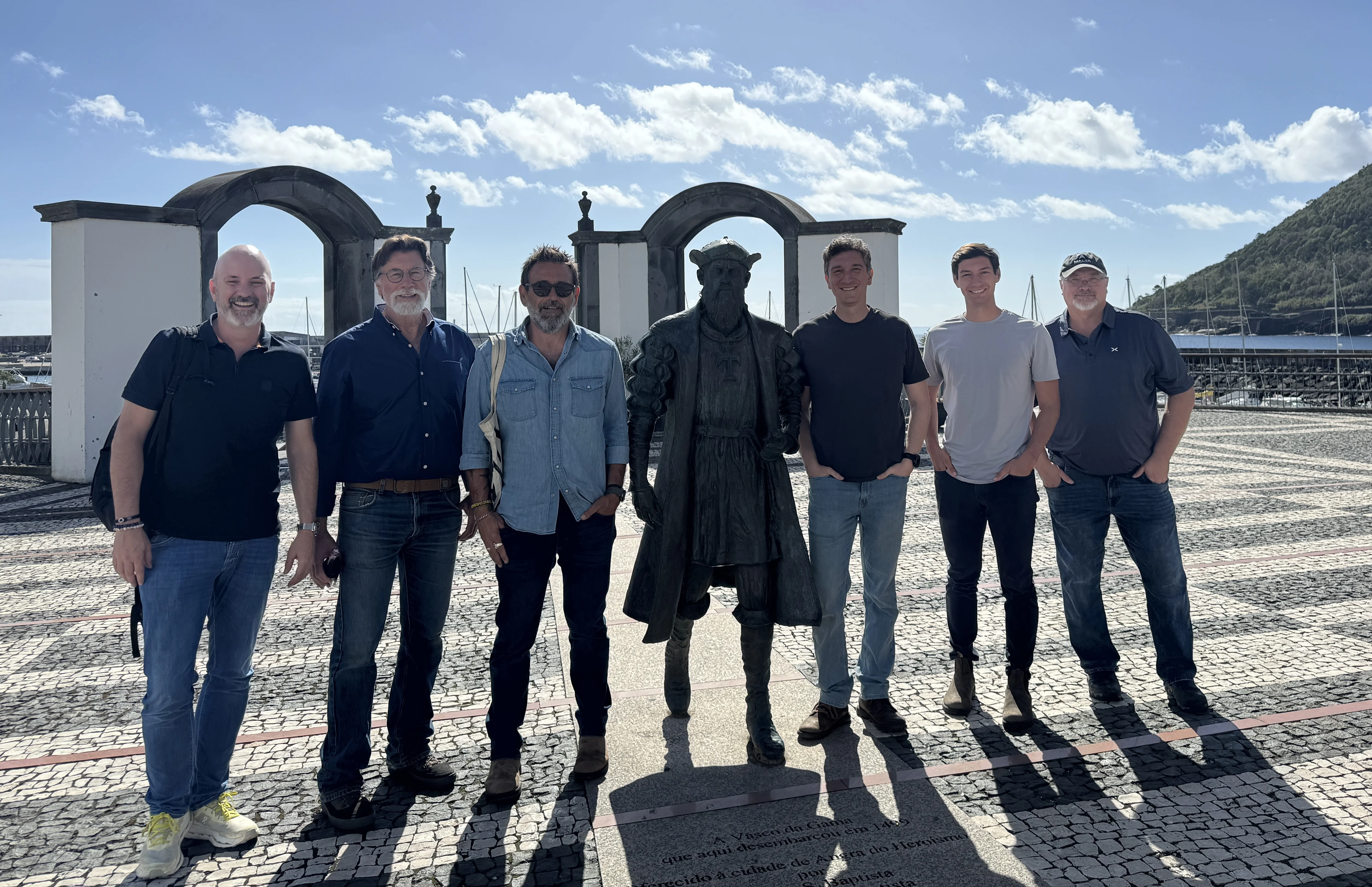 The Oak Island Team at the Vasco da Gama statue in the harbour of Angra do Heroismo on the island of Terceira, Azores in October 2025 (Corjan Mol, Rick Lagina, Emiliano Sacchetti, Alex Lagina, Peter Fornetti and Doug Crowell)