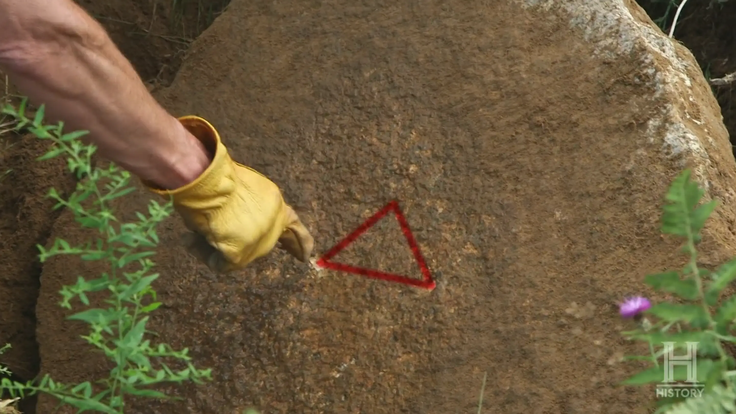The three dots and triangle on the Kingdom stone on Oak Island