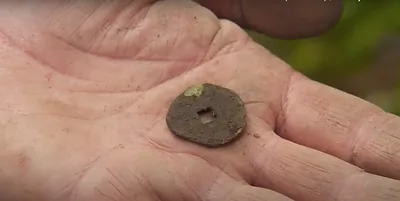 Chinese cash coin (square hole) — Oak Island artifact