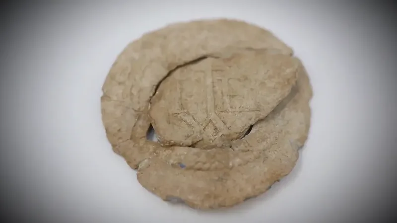 Lead Bag Seal - Norwich Cloth — Colonial Artifact found at Other, Oak Island, Nova Scotia. Dated: 1638-1714