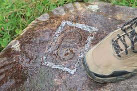 Masonic 'G' stone — prediscovery carved_stone. found at Smith's Cove, Oak Island. Dated: 1967 recovery