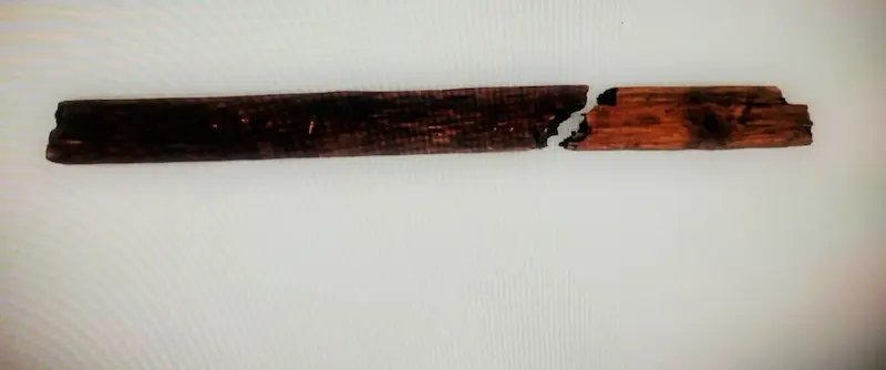 Wooden ship's railing — medieval artifact. found at The Swamp, Oak Island. Dated: Carbon dated: 660-770 AD