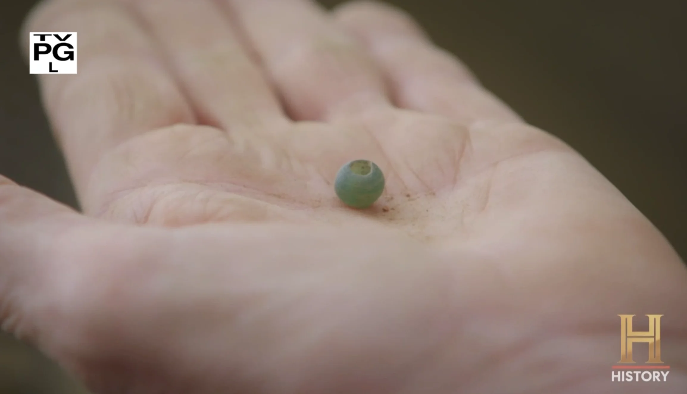 Wound glass bead (forest glass, Normandy)